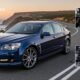 Holden Commodore Sedan parked on road, showcasing its sleek design, classic Australian full-size car features, and style